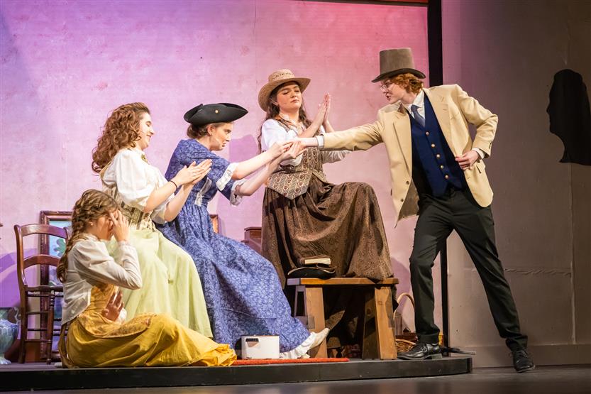 Students act onstage